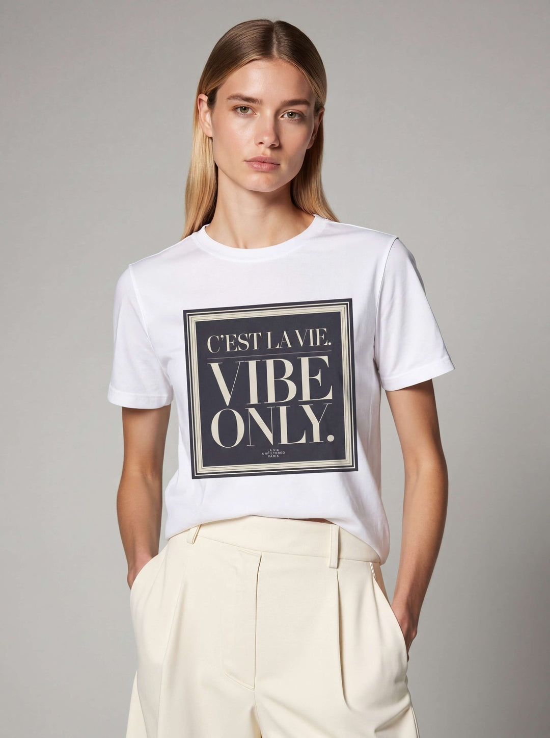 Model wearing White with C’est La Vie, Vibe Only graphic by La Vie unfiltered
