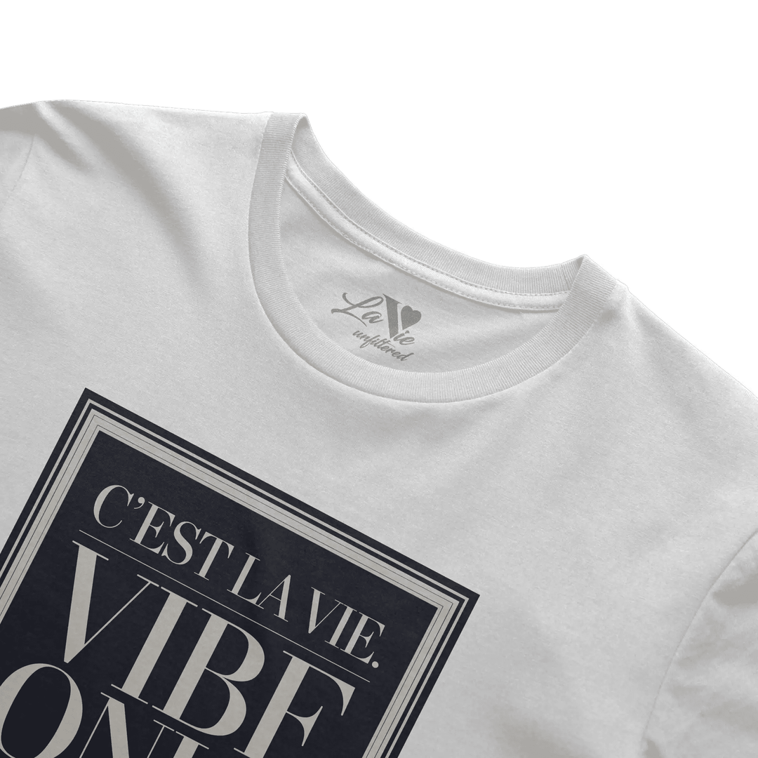 White t-shirt with C’est La Vie, Vibe Only graphic by La Vie unfiltered