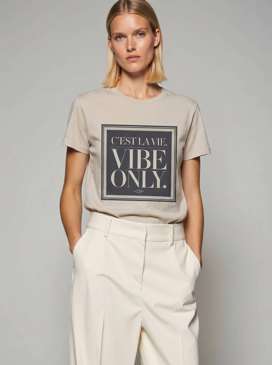 Model wearing Soft Sand with C’est La Vie, Vibe Only graphic by La Vie unfiltered