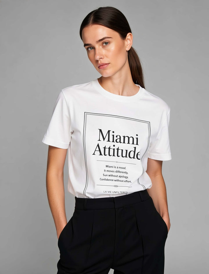 Model wearing White with Miami Attitude graphic by La Vie unfiltered
