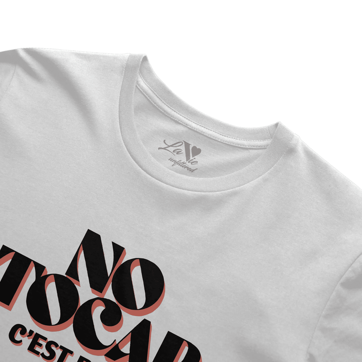 White t-shirt with No Tocar. C&