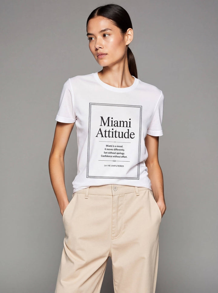 Model wearing White with Paris Attitude graphic by La Vie unfiltered