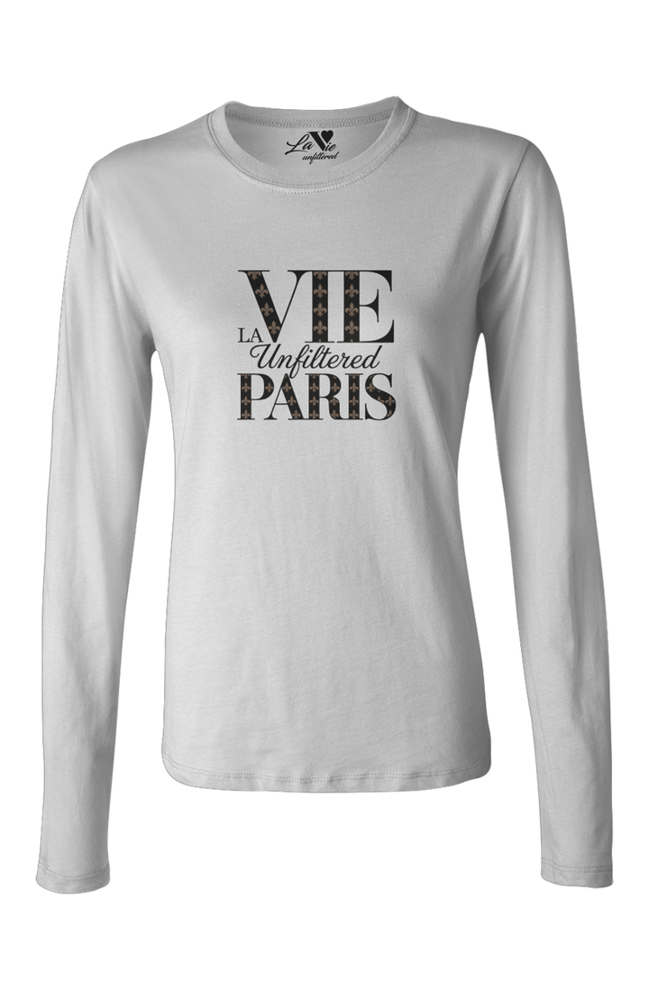 White long-sleeve La Vie unfiltered shirt with bold black text “VIE LA Unfiltered PARIS” across the chest, featuring a subtle star-pattern detail inside the letters.