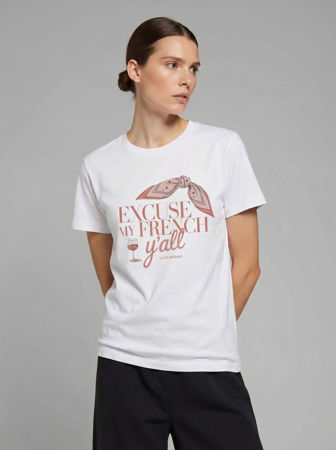 Model wearing White with The French Excuse graphic by La Vie unfiltered