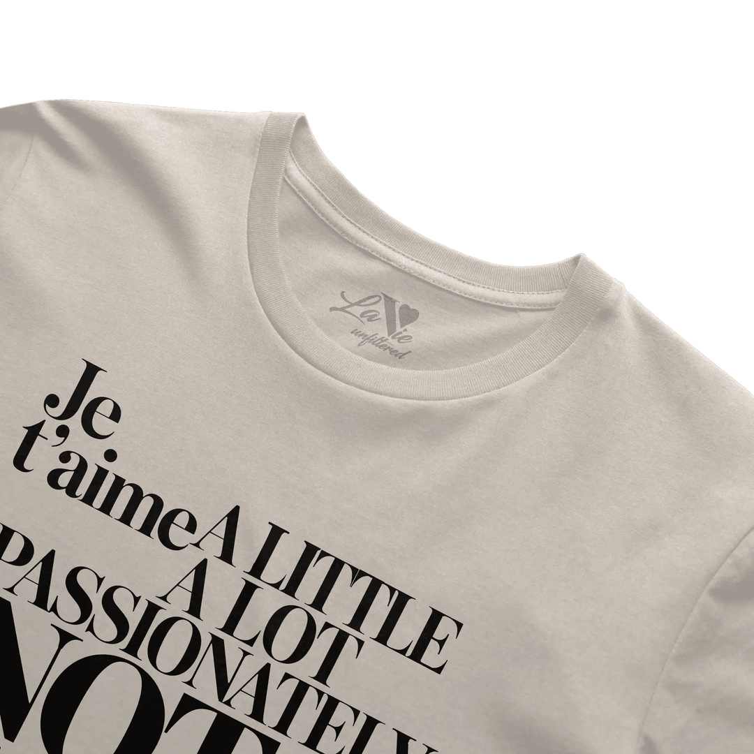 Soft Sand t-shirt with The Paris Paradox graphic by La Vie unfiltered