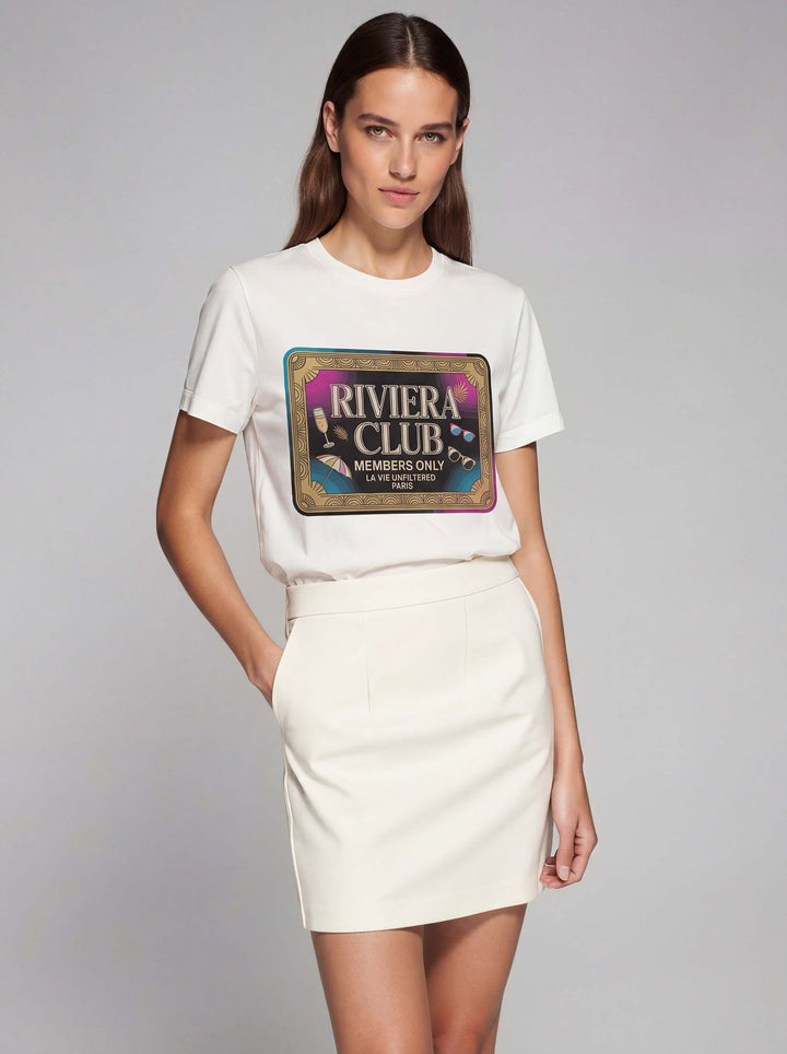 Model wearing White with The Riviera Club Pass graphic by La Vie unfiltered